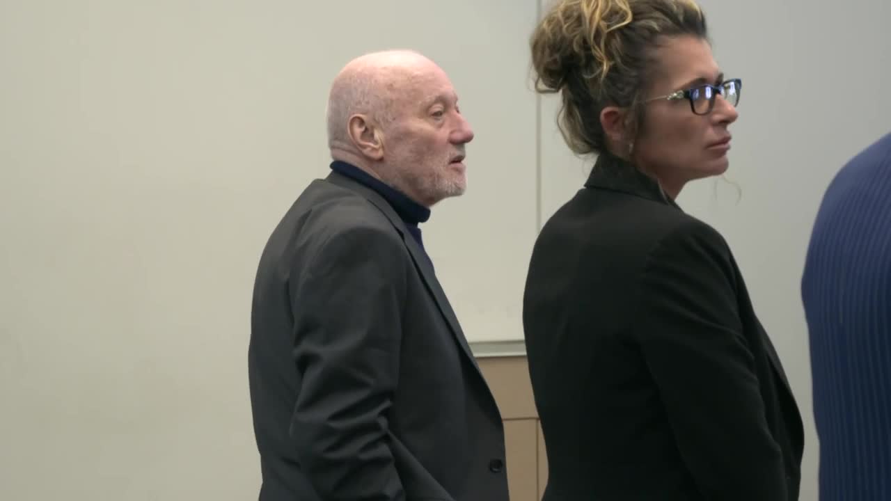 Joseph Ables wearing black suit in court