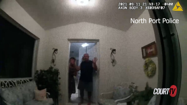 police body cam footage of a couple answering their door