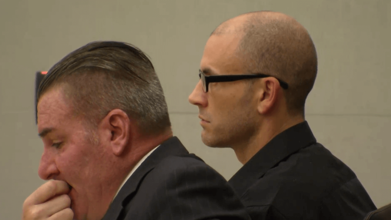 Brandon Janik sits in court