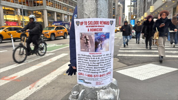 photo offering reward for homicide arrest