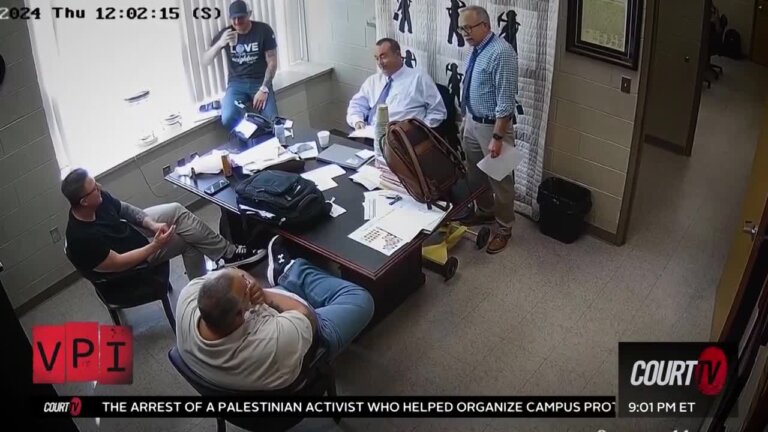 photo of video still shot of group of men