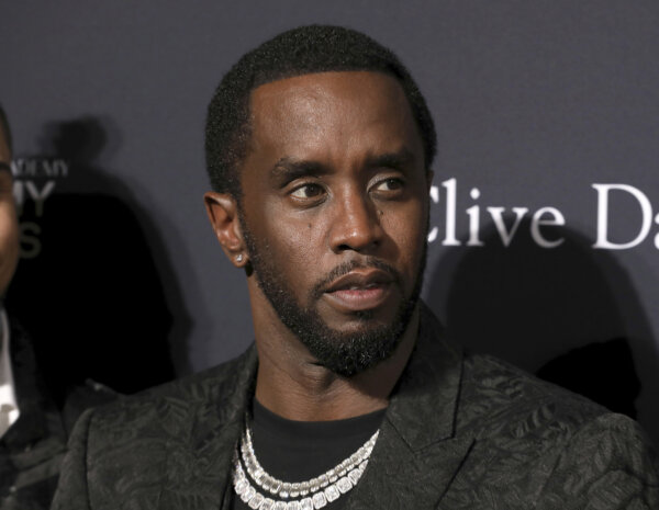 Sean Combs arrives at the Pre-Grammy Gala