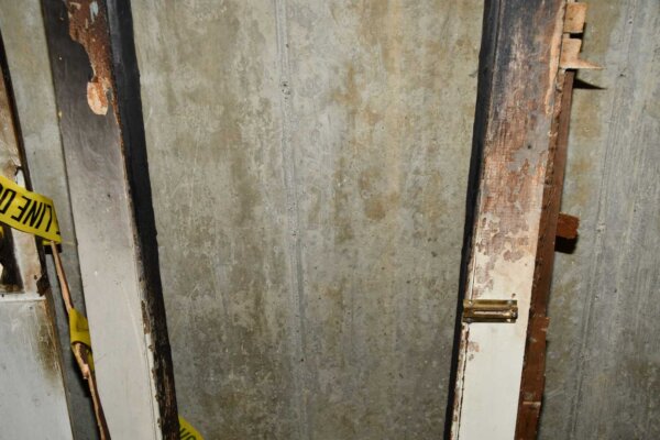 burned door with chain lock