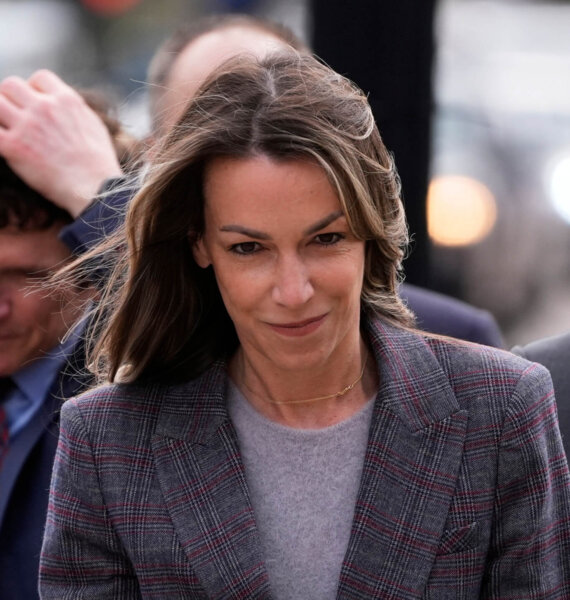 Karen Read smiles as she walks into court