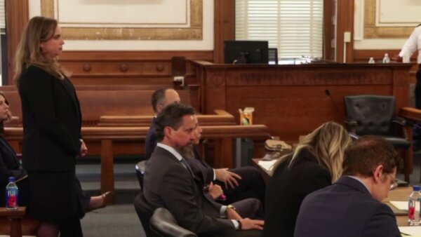 Victoria George stands in court