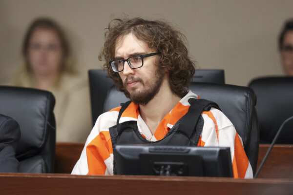 Patrick Crusius sits in court