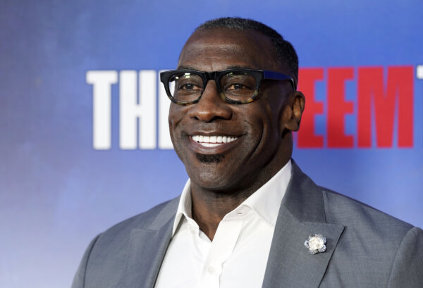Shannon Sharpe poses