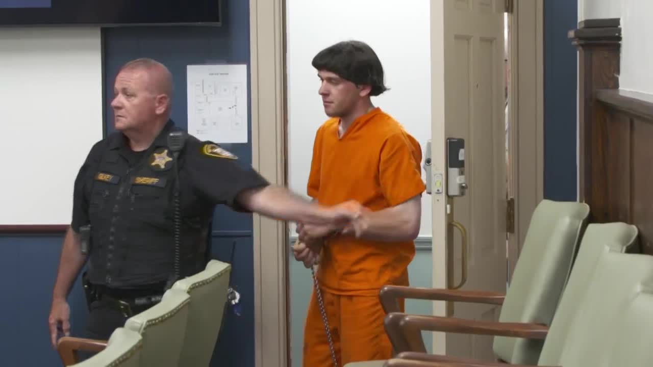 Samuel Hochstetler walks into court