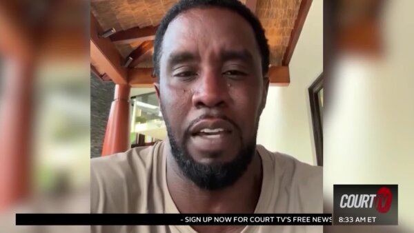 Diddy looks at camera