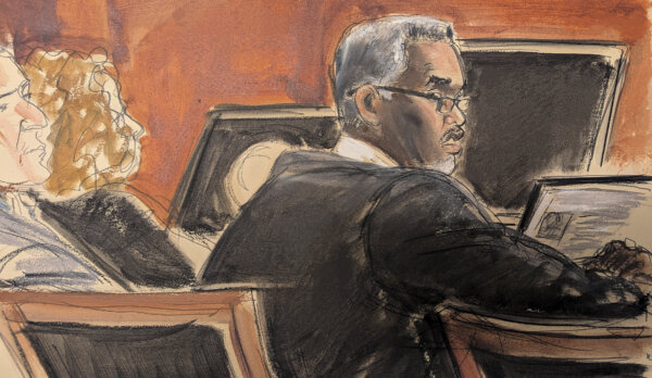 Sean Diddy Combs sits at the defense table before the start of jury selection