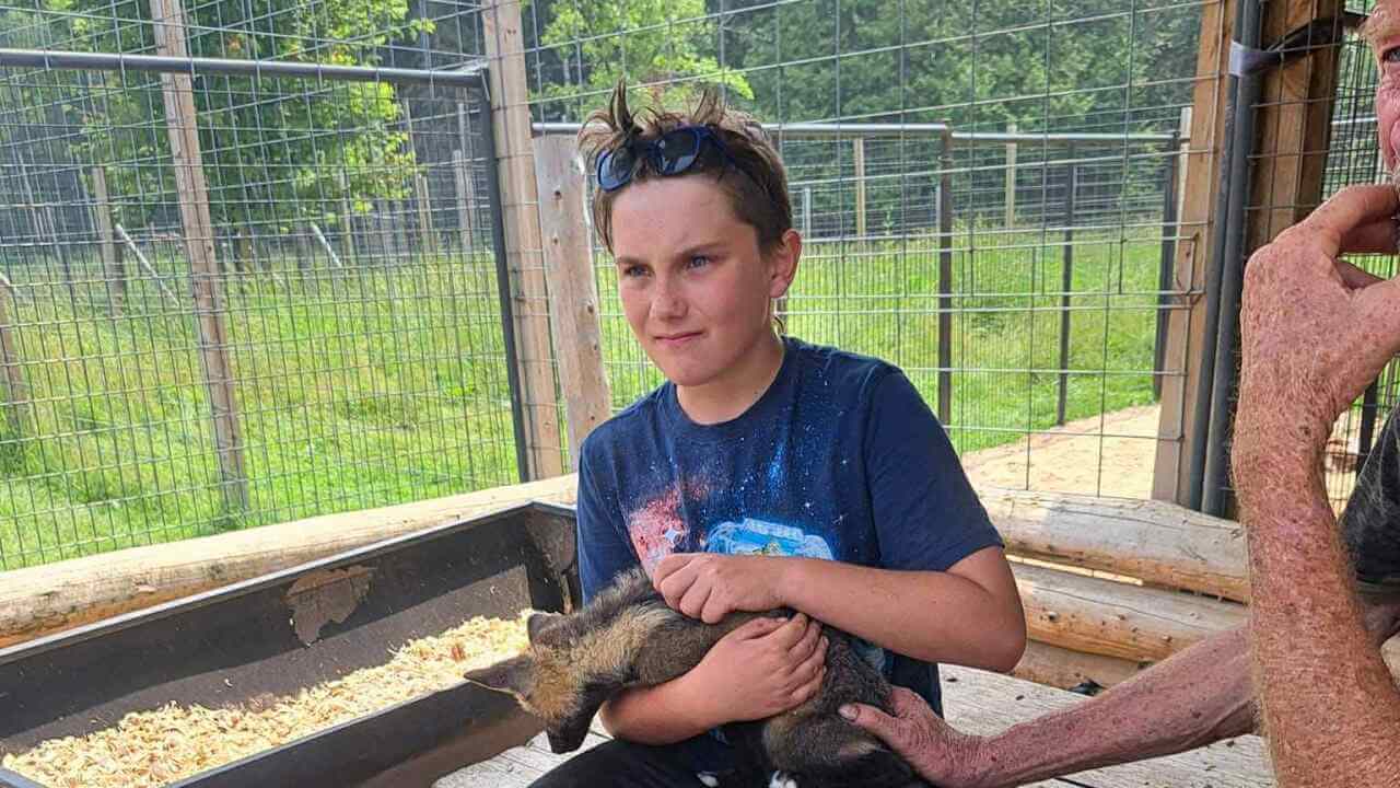 Jakob Bowerman holds an animal