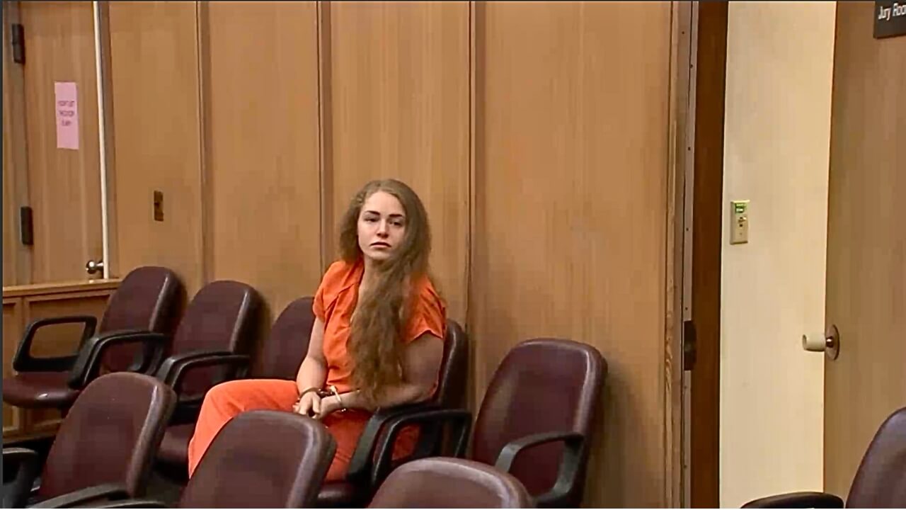 Courtney Clenney sits in court