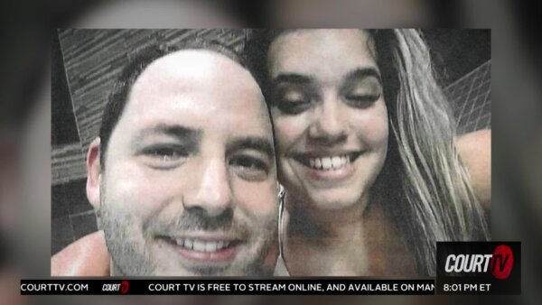 photo of male and female smiling