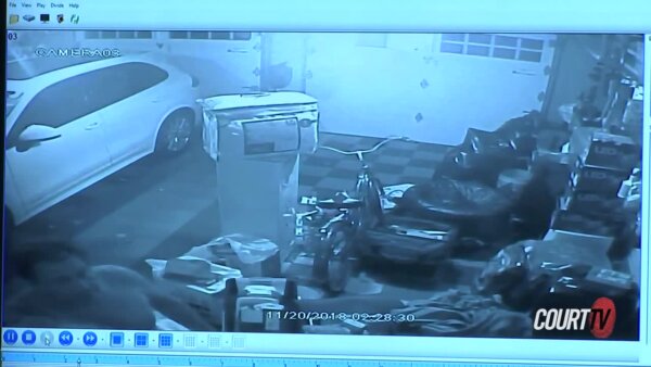surveillance video inside garage shows man at bottom