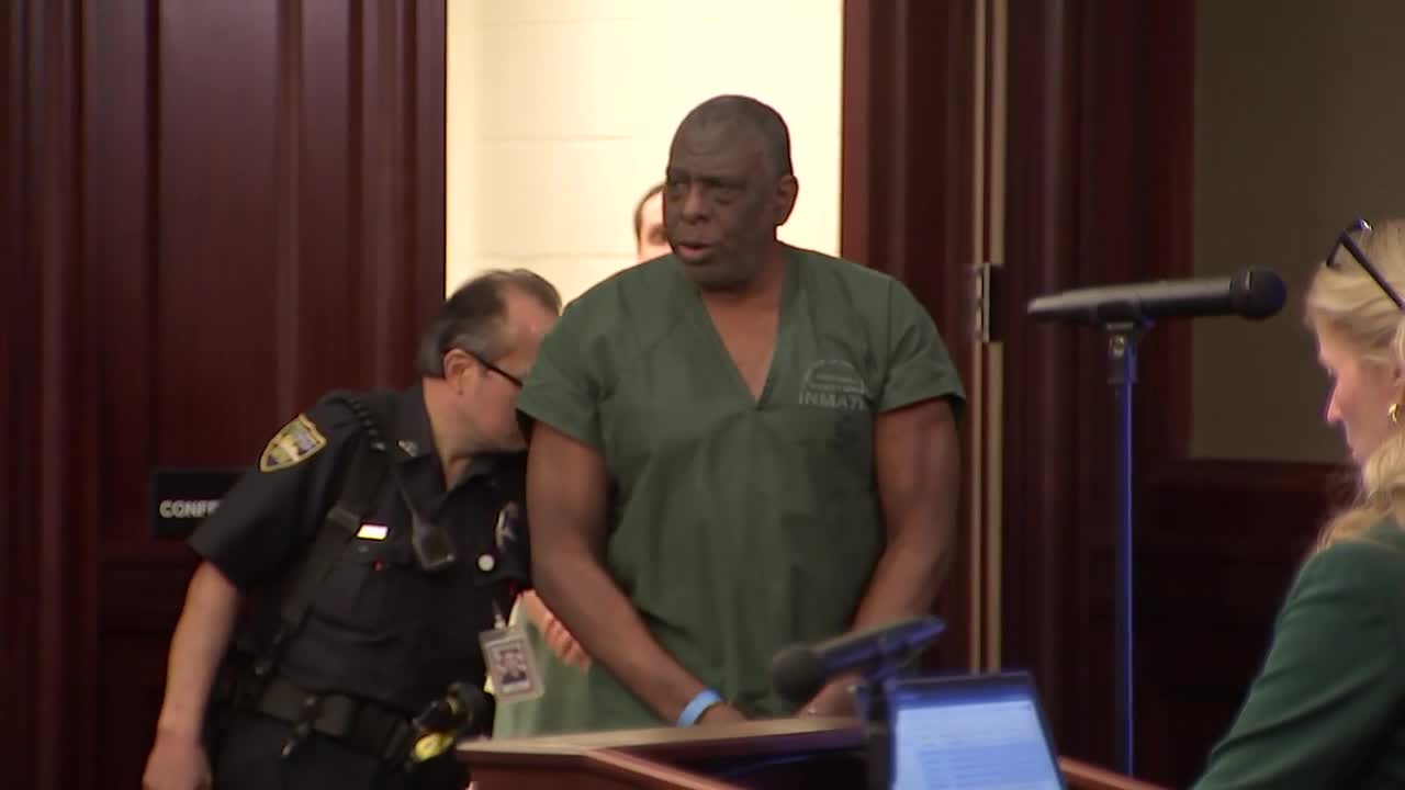 Henry Tenon walks into court