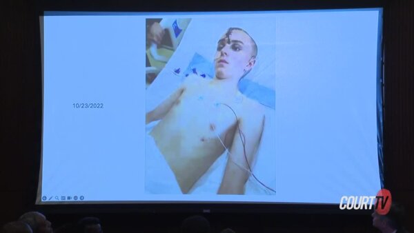 Photo of Austin Thompson in hospital bed