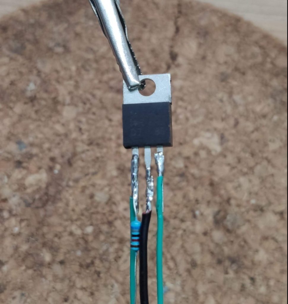 Topview of the negative wire soldered to the drain of the MOSFET