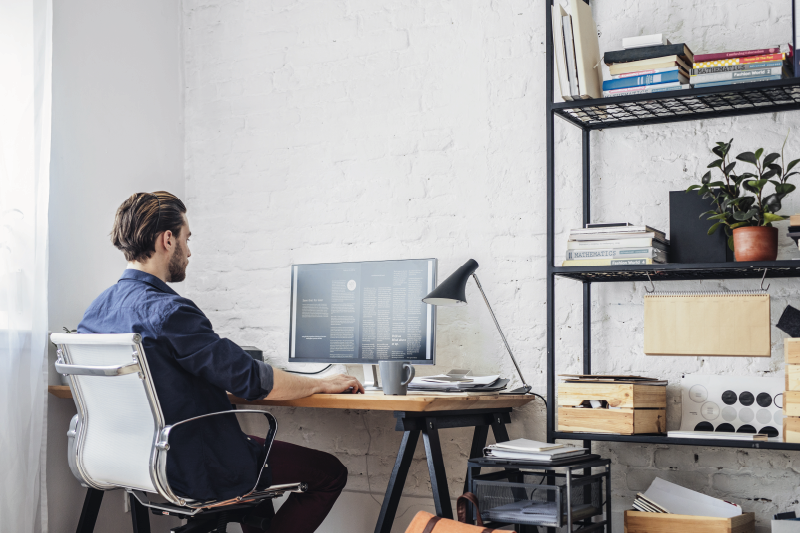 man looking at screen and marketing trends