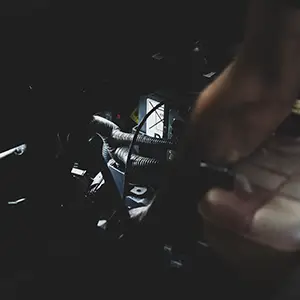 mobile mechanic inspecting an air conditioning unit