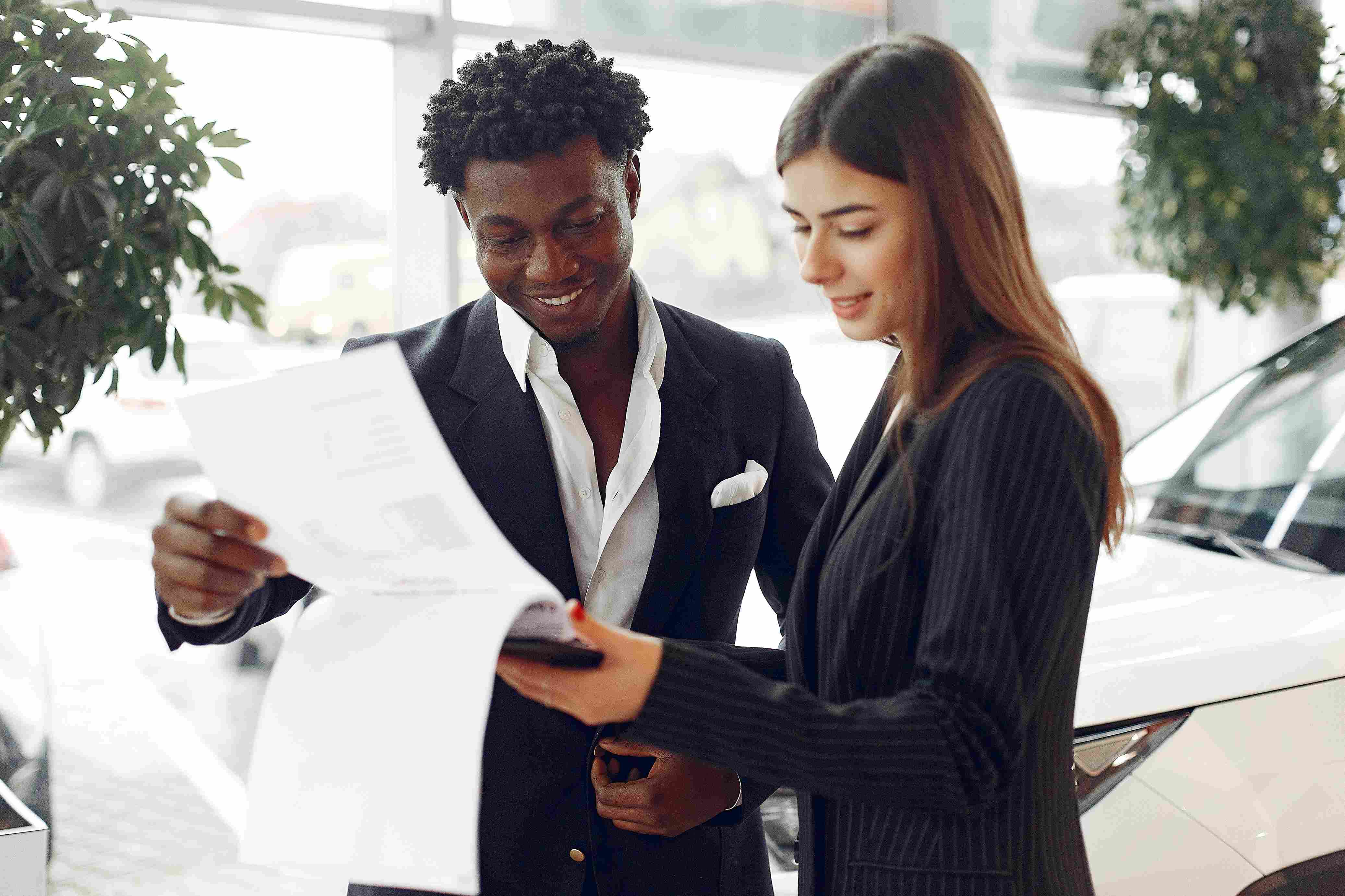 two people looking at paperwork