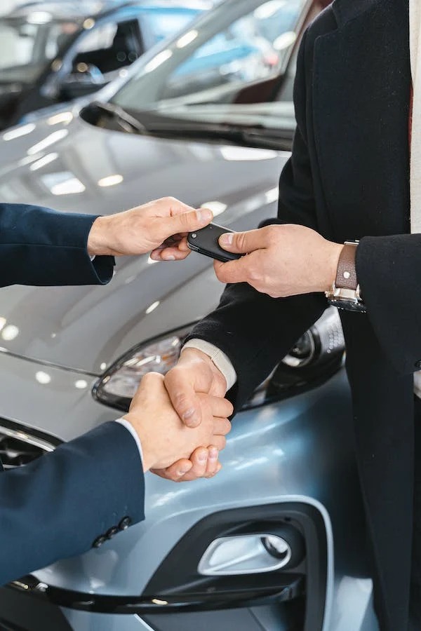 Shaking Hands & Handing Over The Keys