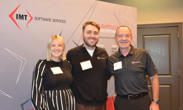 IMT employees at insurance industry event