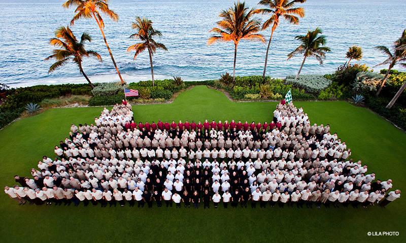 Team Members gather to form the shape of the hotel on the Ocean Lawn at The Breakers Palm Beach