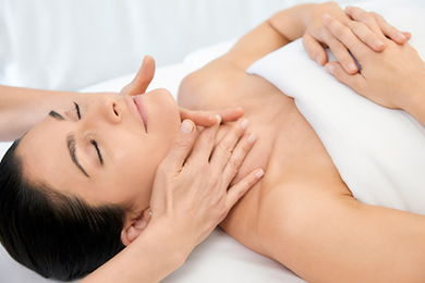 A guest enjoys a facial at The Spa at The Breakers