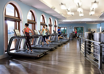 Guests workout inside The Breakers Ocean Fitness center 