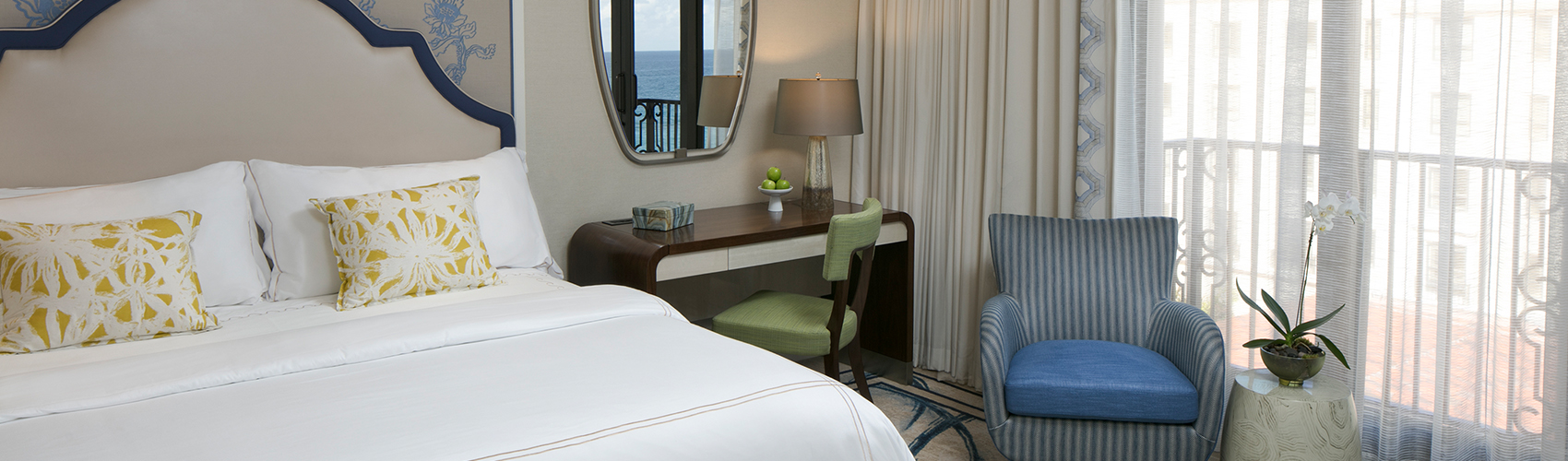 Premium Guest Room with Partial Ocean View and King Bed