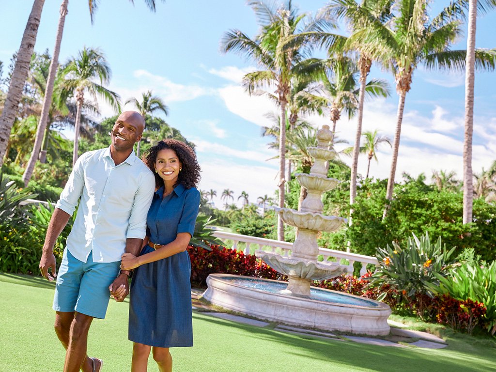 A couple walking at The Breakers Palm Beach