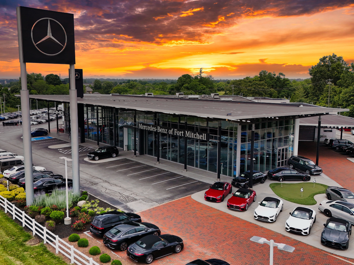 Aerial view of Mercedes-Benz of Fort Mitchell and its lot at sunset