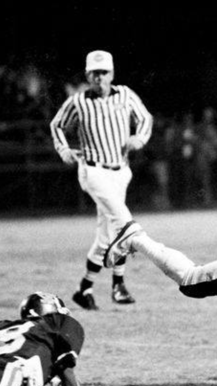 Ray Fuller officiating a game