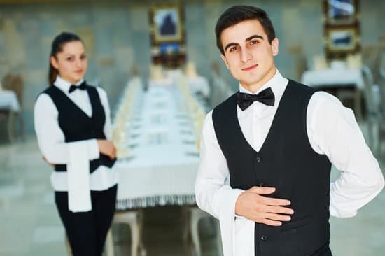 canva-young-waiter-and-waitress-at-service-in-restaurant-MADasGxK4s4.jpg