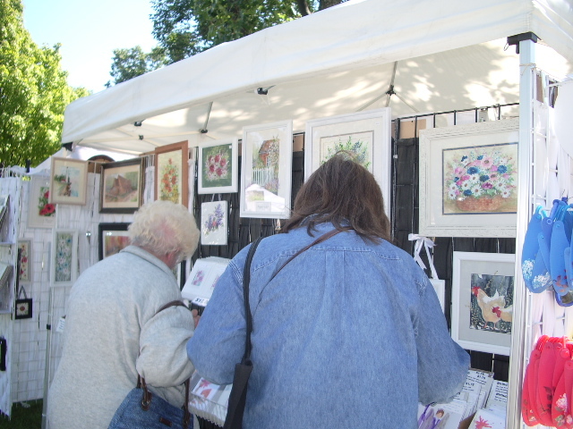 Group of Patrons Vieweing Artist's Work 