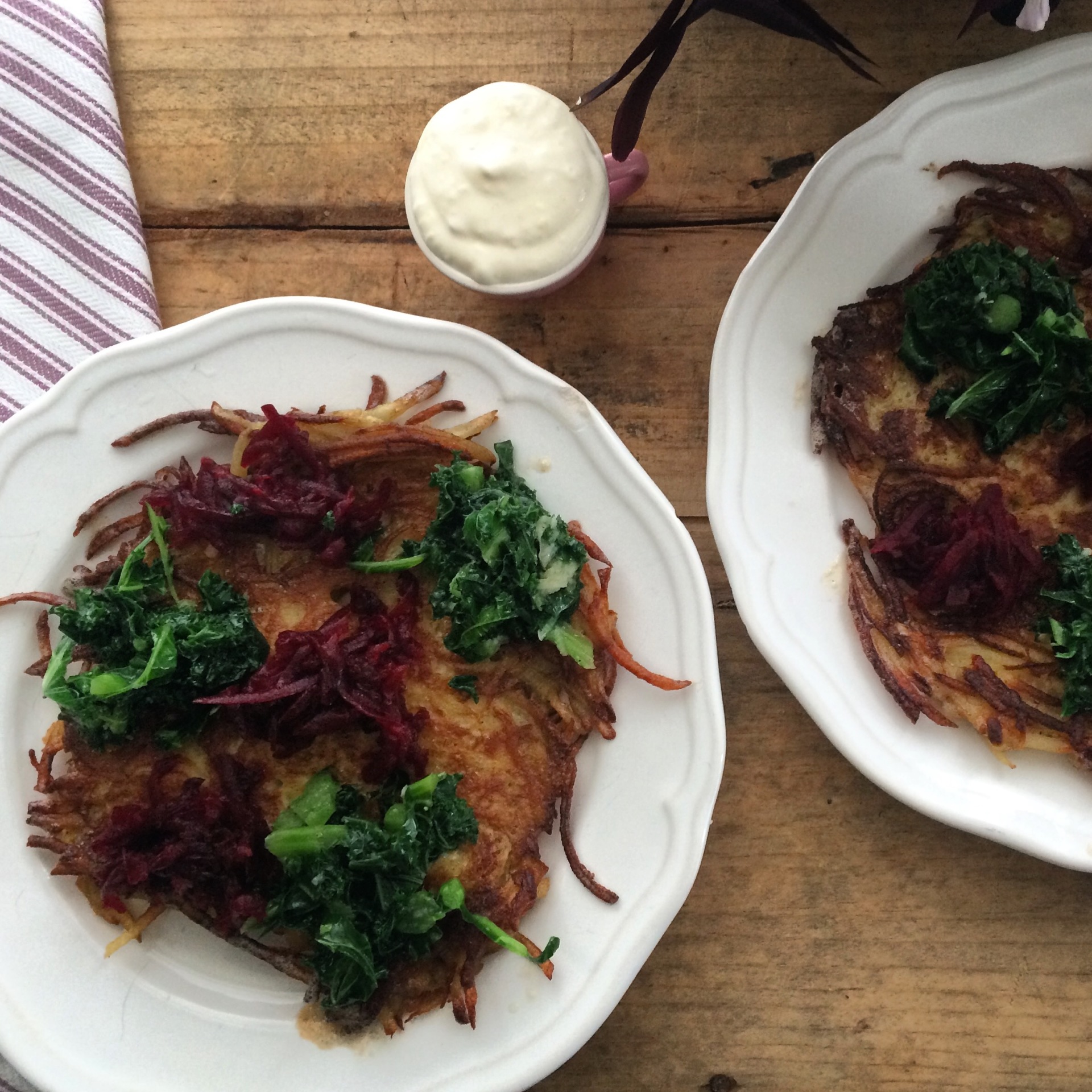 Hash browns with Sautéed Garlic Kale and Beetroot to be topped with Chevre cream with Honey.