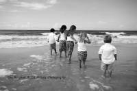 family beach portrait water kids waves