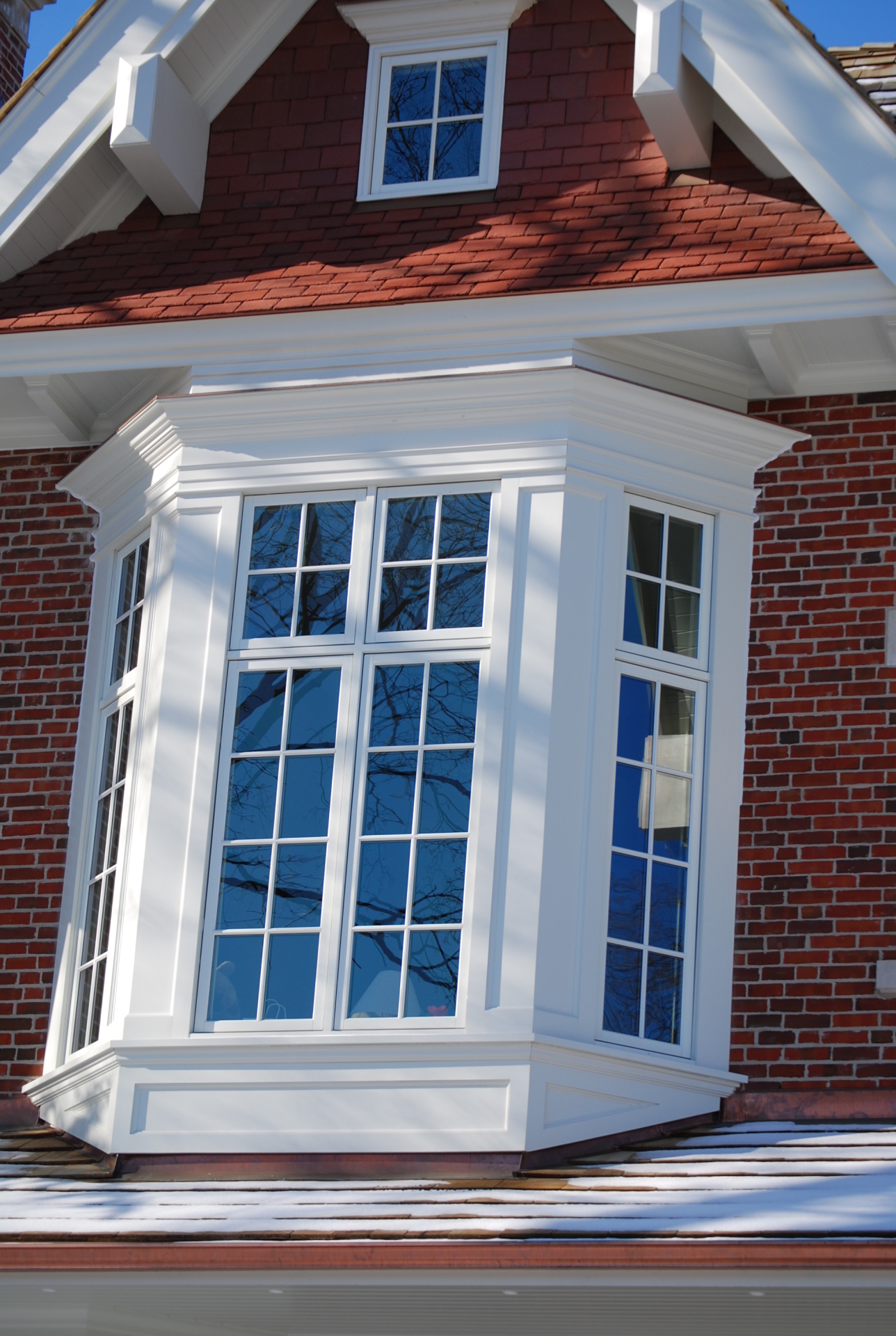 boxed out windows, bay window, dormers, window cladding, exterior trim, exterior carpentry, exterior wood work, toronto homes, window trim, roof dormers, cornice moulding