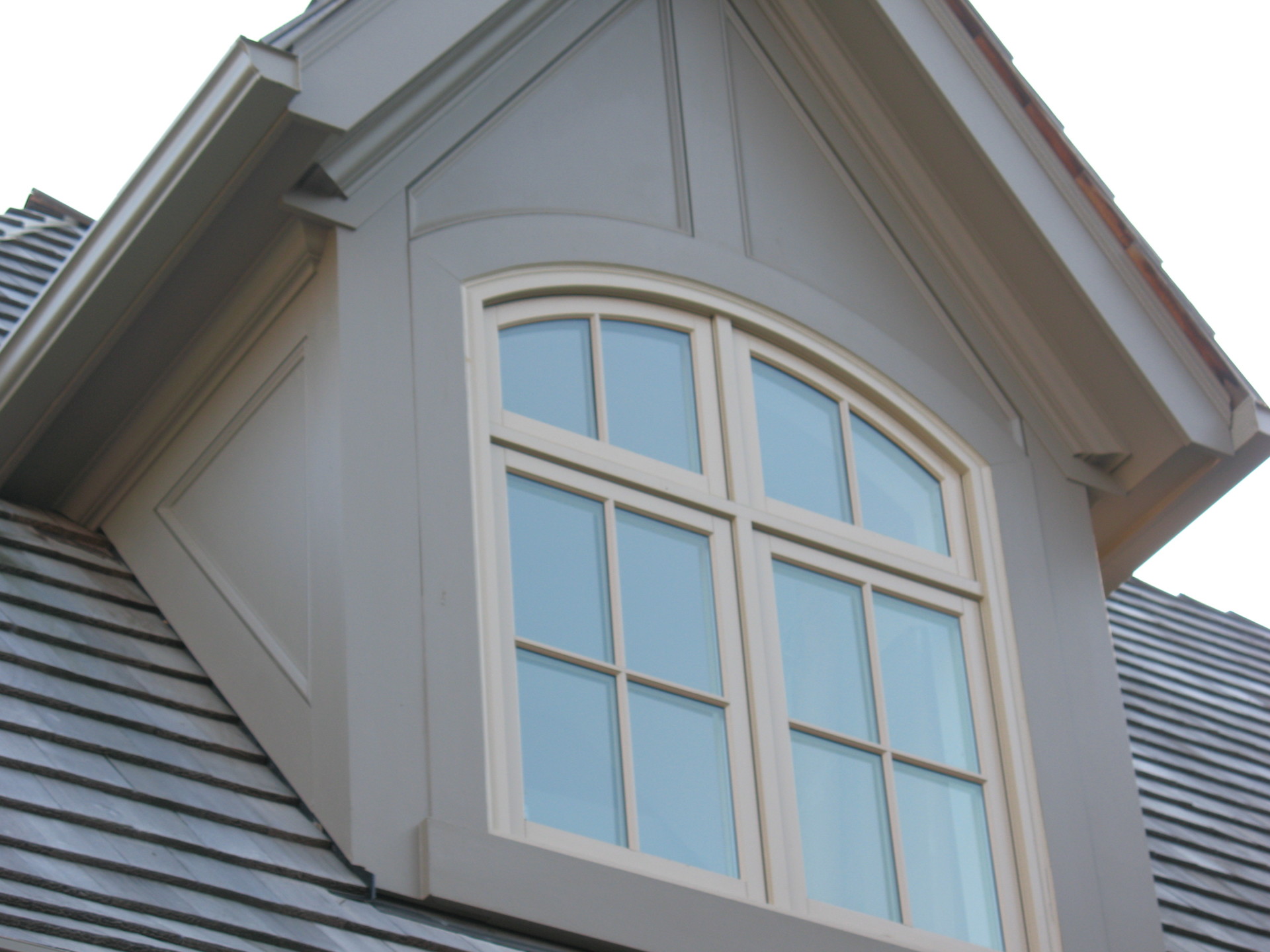 boxed out windows, bay window, dormers, window cladding, exterior trim, exterior carpentry, exterior wood work, toronto homes, window trim, roof dormers, cornice moulding