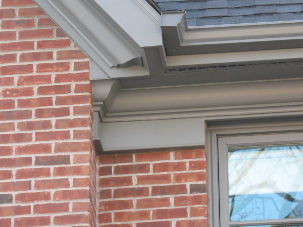 soffit, fasia, frieze board, cornice moulding, Leed home clad in pre-dipped and treated cedar shakes