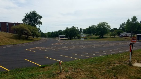 The "Works" Crack fill, Sealcoat, and Striping in Mid-Missouri