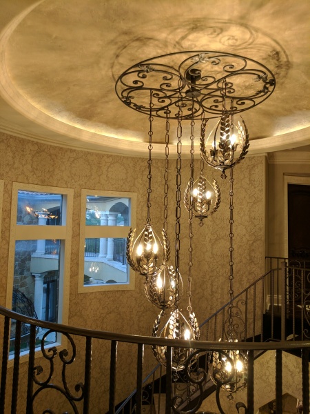 great room staircase pendant after