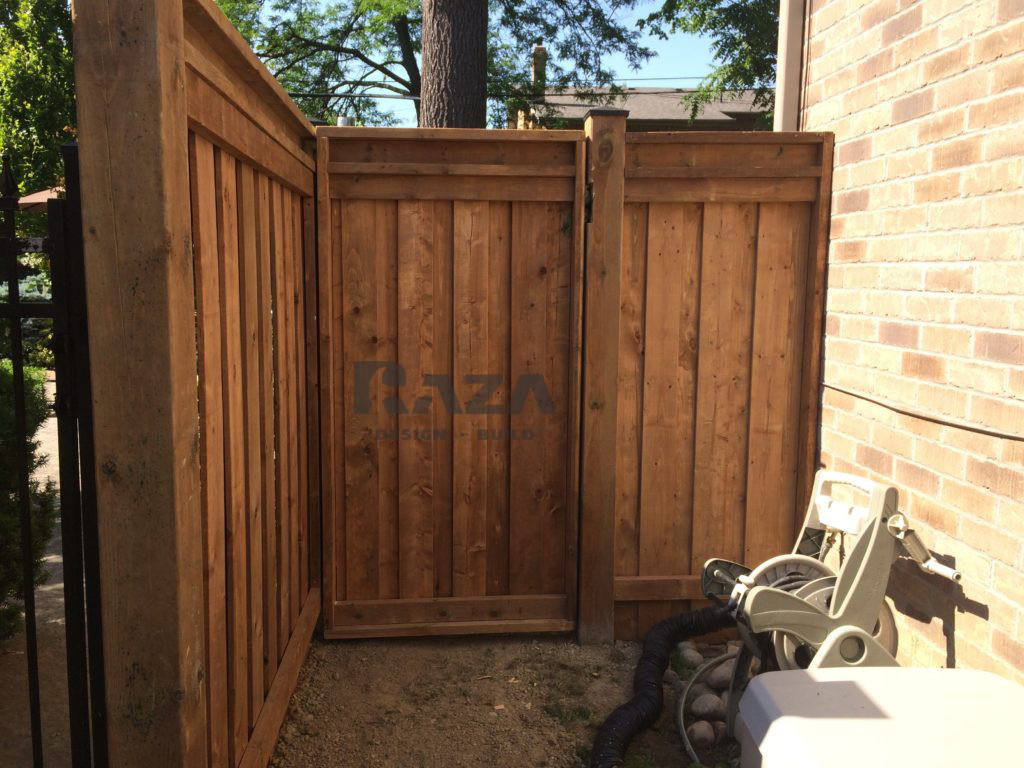 Brown pressure treated ful privacy with decorative I beam single gate