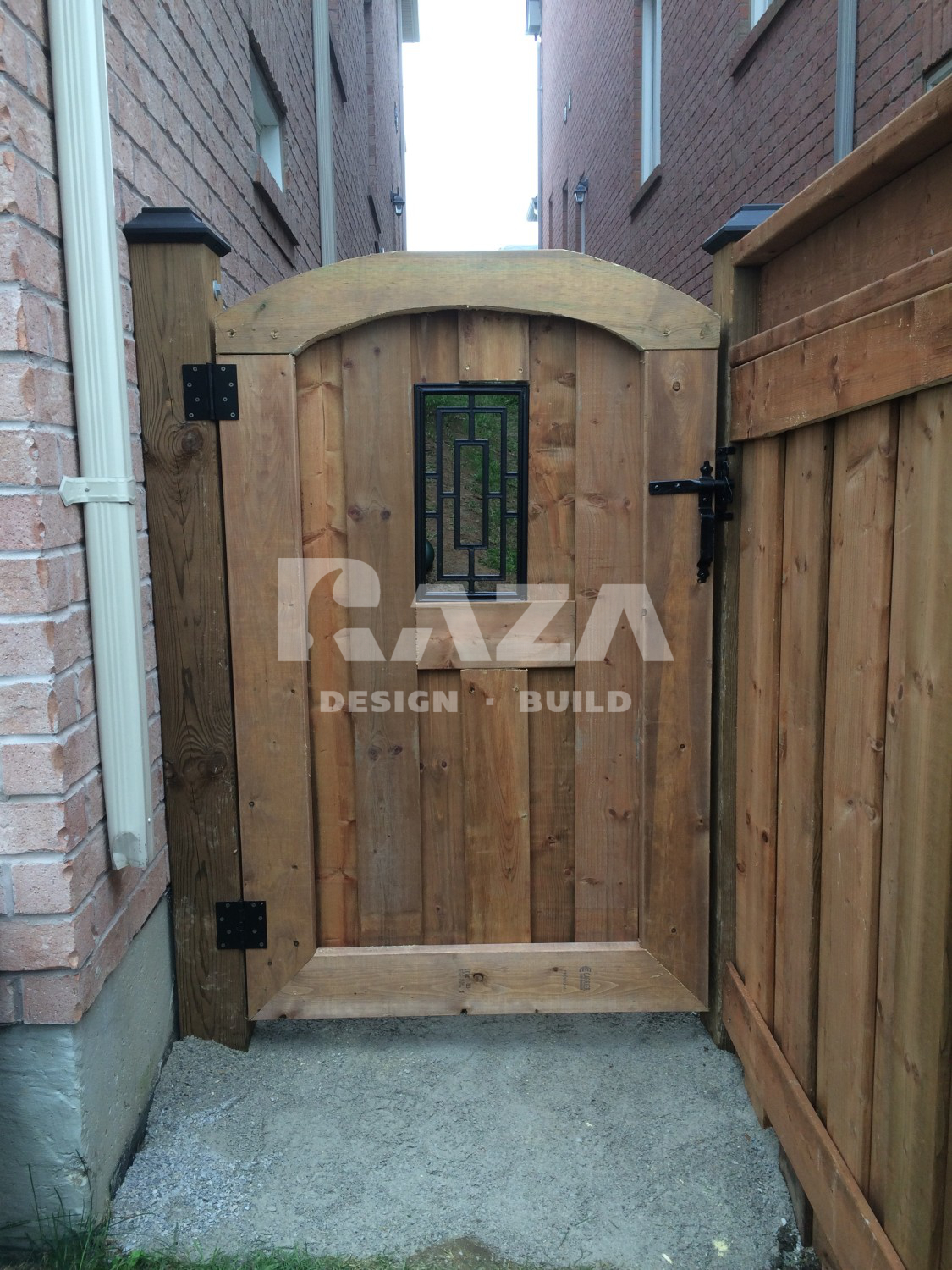 Brown pressure treated square insert ornamental gate