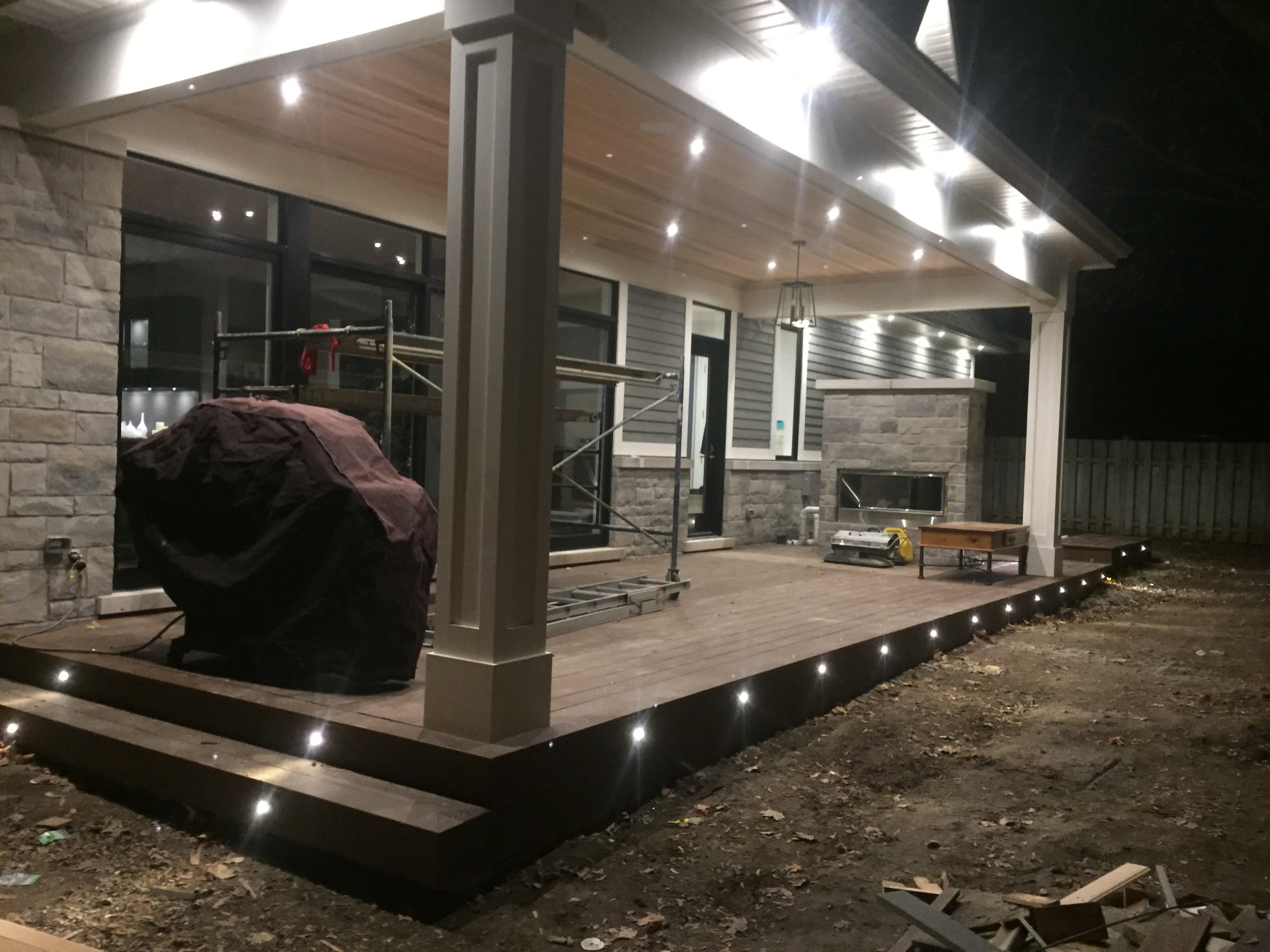 Composite low deck with wrap around stair lighting