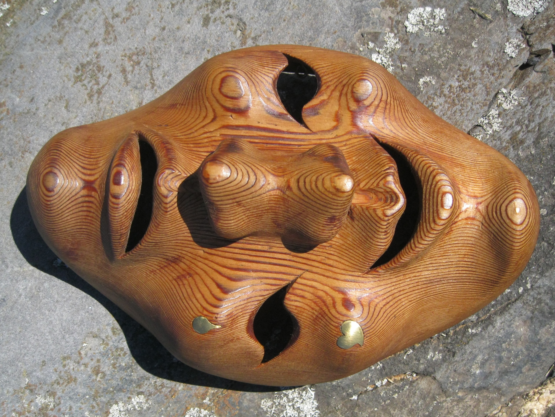 Two-faced mask of Western red cedar