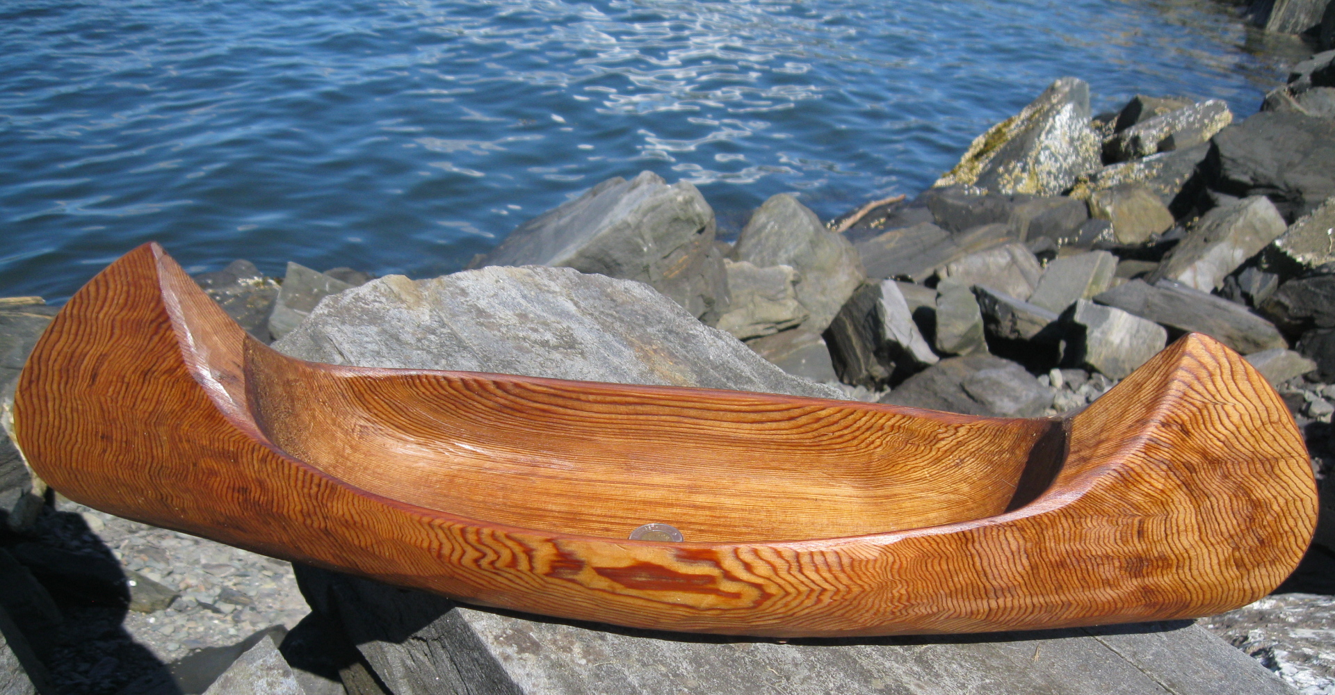 Western red cedar canoe with wave pattern