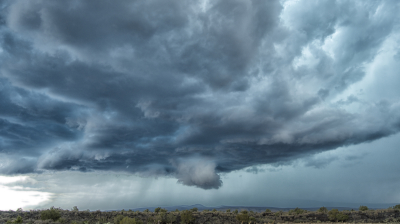 A weak wall cloud takes shape over the El Malpais National Monument in west central New Mexico.