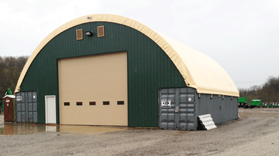 Fabric covered metal frame hoop building shipping container