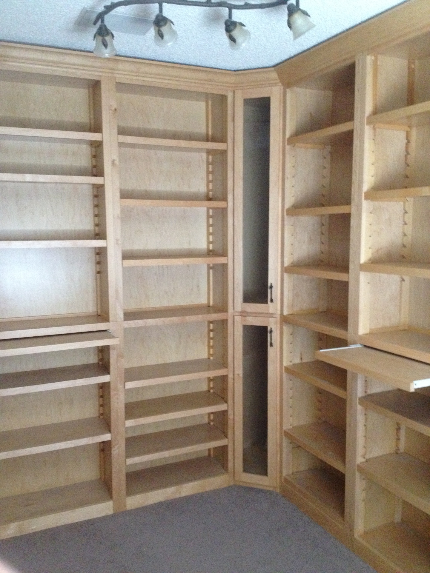 built-in maple bookcase with adjustable shelving